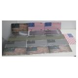 Sixteen Assorted NIP US Flag License Plates