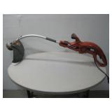 Grass Hog XP Electric Weed Whacker Powers On