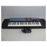 Yamaha PSR-77 Electronic Keyboard Powers On