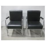 Two  P.S. Pibbs, Inc Black Padded Chairs See Info