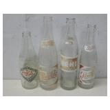 Four Vintage Glass Coca-Cola Bottles
