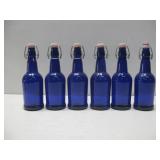 Six Blue Glass Bottles W/Ceramic Stoppers 9'