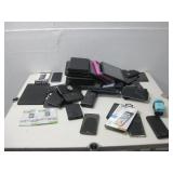 Assorted Phones, Tablets, & Chargers None Power On