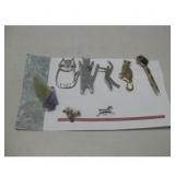 Eight Assorted Pins/Brooches