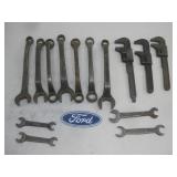 Lot of 14 Ford wrenches and a Ford emblem