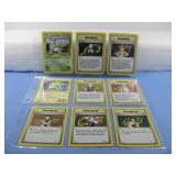 Nine Assorted Pokemon Trading Cards In Sleeve