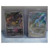 Two Japanese Pokemon Cards In Protectors