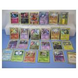 Twenty Four Assorted Pokemon Trading Cards W/Holos