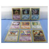 Nine Assorted Pokemon Trading Cards In Sleeve