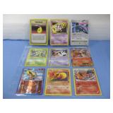 Nine Assorted Pokemon Trading Cards In Sleeve