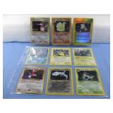 Nine Assorted Pokemon Trading Cards In Sleeve
