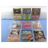 Nine Assorted Pokemon Trading Cards In Sleeve