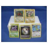 Five Pokemon Cards Including Holographic