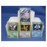 Four Japanese Pokemon Cards Including Holographic