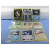 Nine Assorted Pokemon Trading Cards In Sleeve