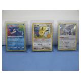 Four Pokemon Trading Cards