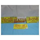 Four New Mexico License Plates