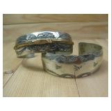 Two Silvertone Stamp Cuff Bracelets