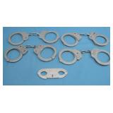 Four Handcuffs & One Set Of Finger Cuffs No Keys