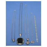 Four Sterling Silver Necklaces & One Bracelet See