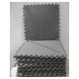 Twenty-Two Foam Grid Floor Squares 24.5' x 24.5'