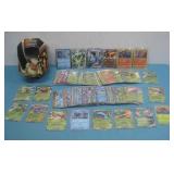 Assorted Pokemon Cards In Pokemon Tin