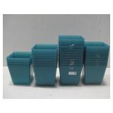 Thirty-Two Plastic Containers 6' x 6' x 6'