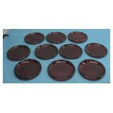 Ten Red Glass Saucers