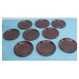 Nine Red Glass Saucers
