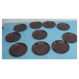 Ten Red Glass Saucers