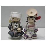 Two Oriental Style Wooden Dolls