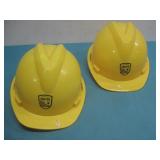 Two NM United Hard Hats