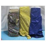 Three Rolls Of Fabric