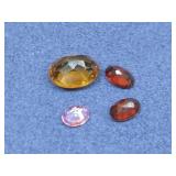 Four Faceted Gemstones