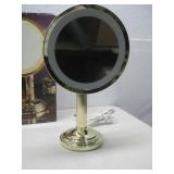 NIOB La Miroir Dore Magnifying Mirror Powers On