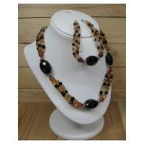 S.S Strand Cebelle Natural Amber Black Beaded See;