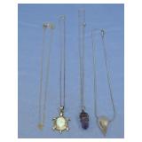 Four Silver Tone Necklaces & Pendants