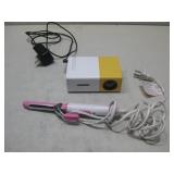 Mini Projector & Croc Curling Iron See Info