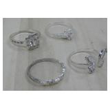 Three S.S. Rings & One Silver Tone Ring