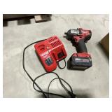Milwaukee Impact Wrench And Battery Charger