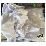 BAG OF WHITE CHAIR COVERS