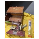 Miniture handcrank sewing machine