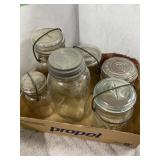 6 MISC JARS WITH GLASS LIDS