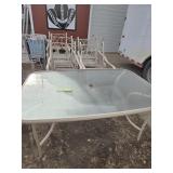 GLASS TOP PATIO TABLE W/6 CHAIRS  60" X 40" 28"