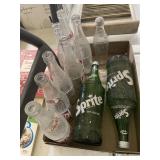 7 PEPSI , 2 SPRITE & 1 COKE BOTTLES