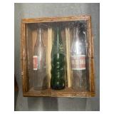 4 Shadow boxes of vintage bottles