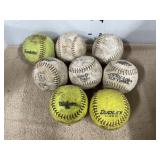 Eight softballs