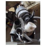 TOTE OF VACUUM HOSES