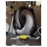 TOTE OF VACUUM HOSES