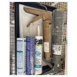 CAULKING GUN AND CAULKING